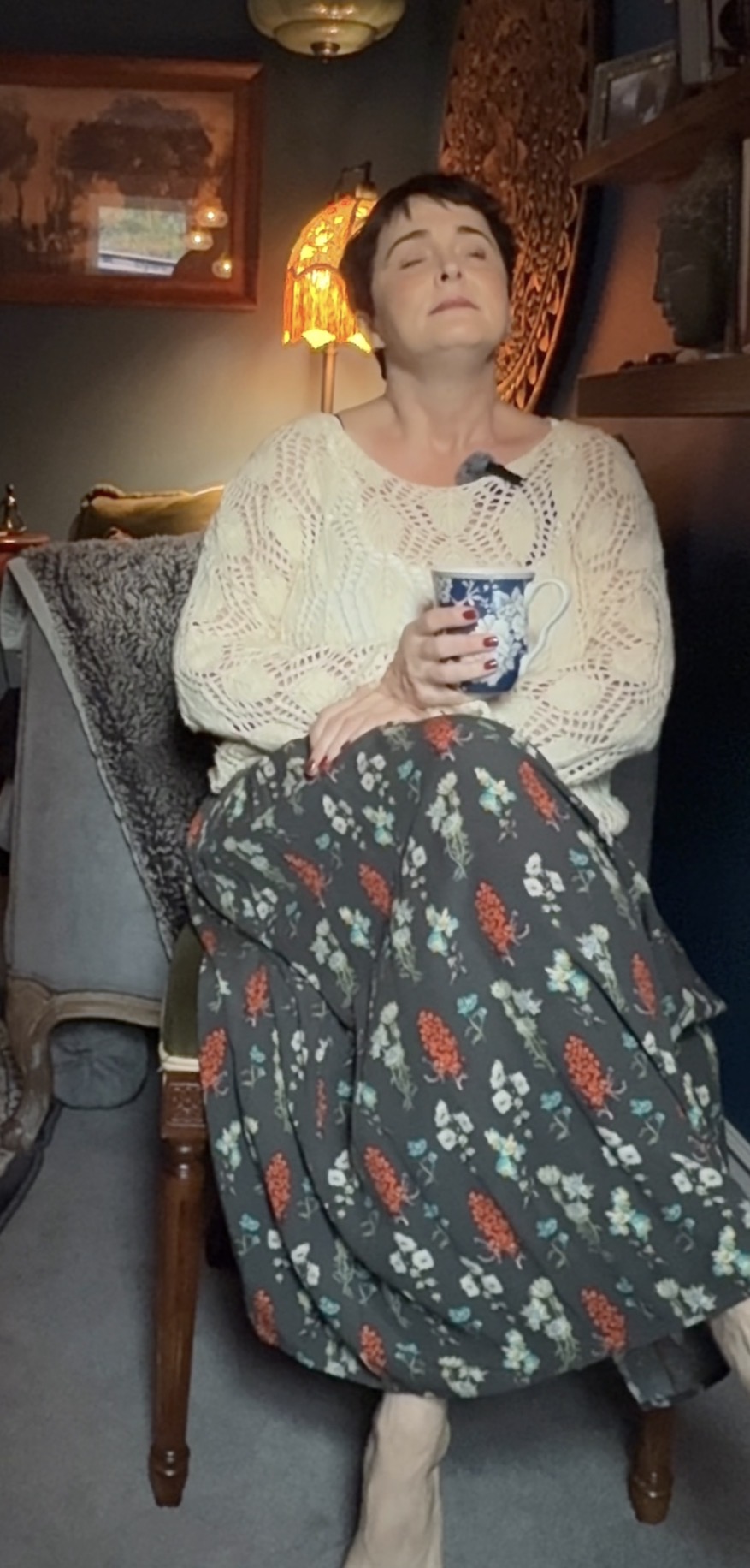 Kelly in a cream sweater, the Choosing It version of herself